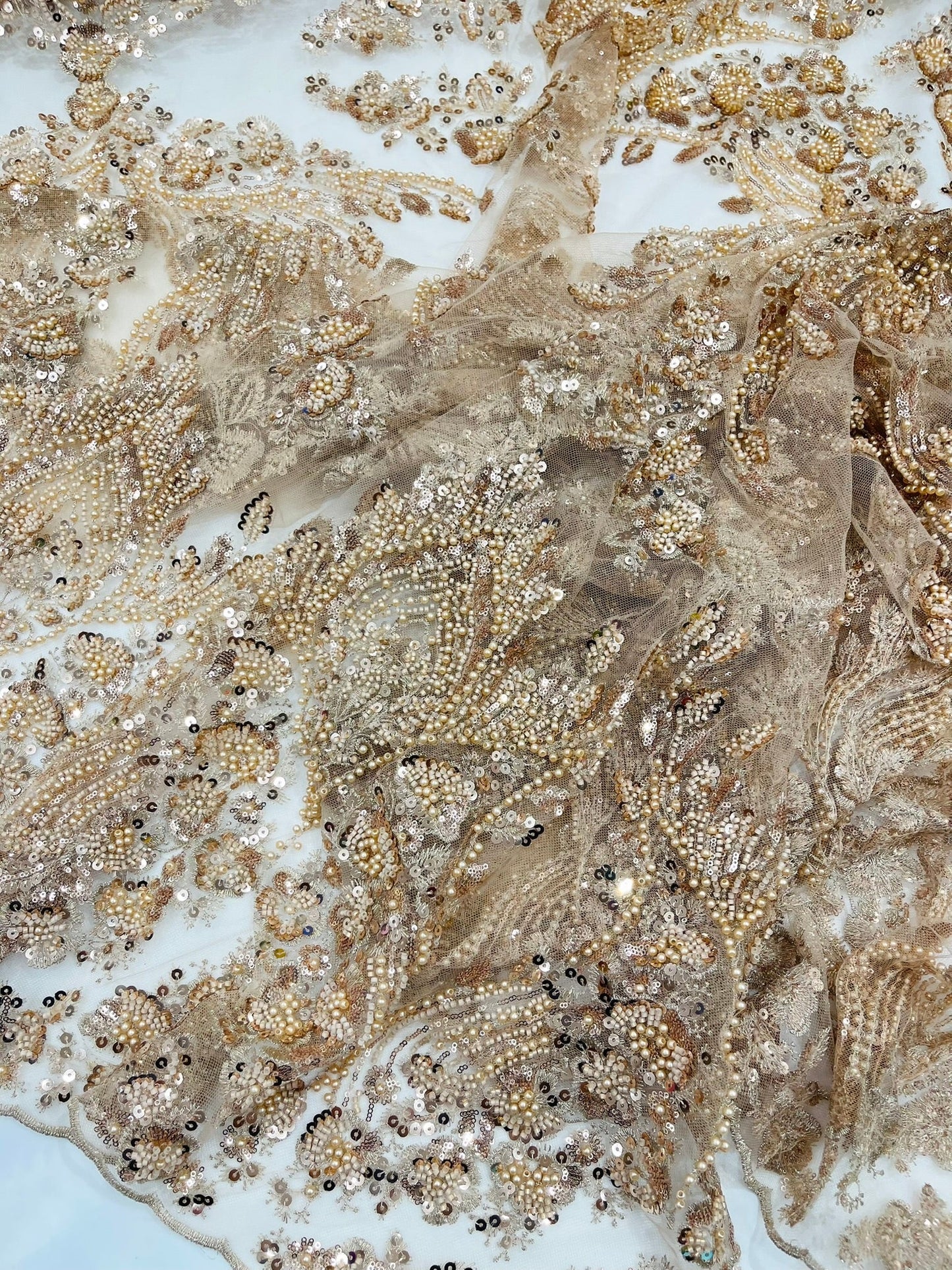 Damask Wing Design Embroidered Heavy Beaded Lace on 54" Mesh Fabric.