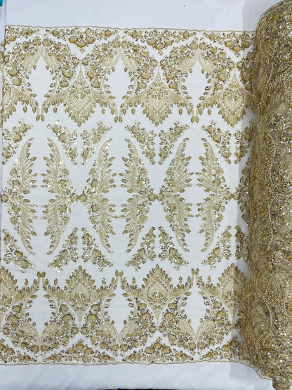 Damask Wing Design Embroidered Heavy Beaded Lace on 54" Mesh Fabric.