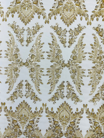 Damask Wing Design Embroidered Heavy Beaded Lace on 54" Mesh Fabric.