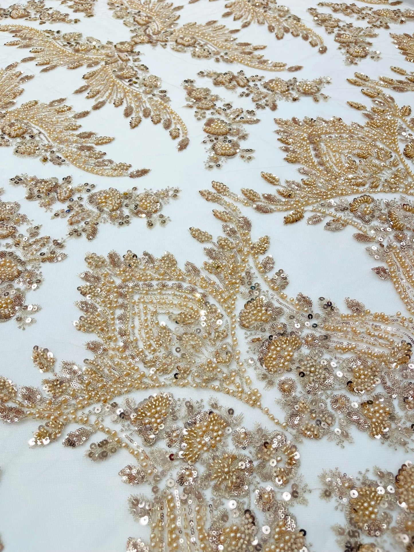 Damask Wing Design Embroidered Heavy Beaded Lace on 54" Mesh Fabric.