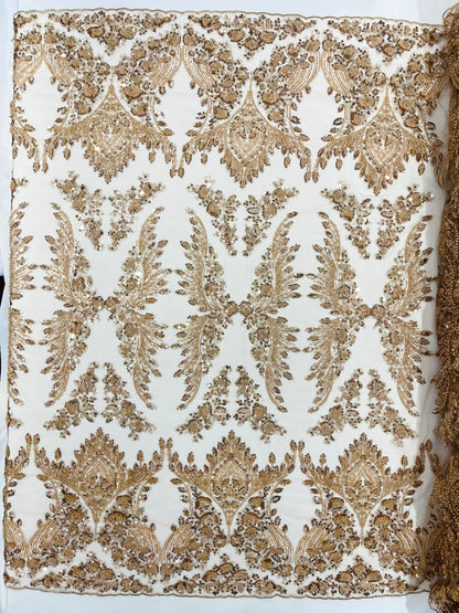 Damask Wing Design Embroidered Heavy Beaded Lace on 54" Mesh Fabric.
