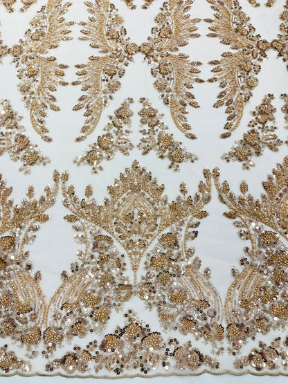 Damask Wing Design Embroidered Heavy Beaded Lace on 54" Mesh Fabric.