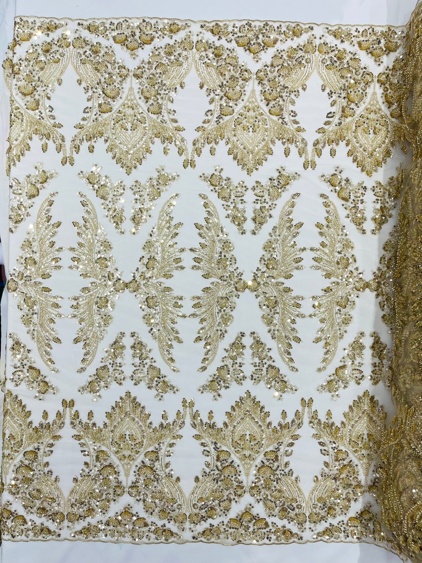 Damask Wing Design Embroidered Heavy Beaded Lace on 54" Mesh Fabric.