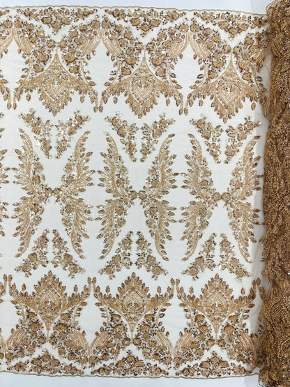 Damask Wing Design Embroidered Heavy Beaded Lace on 54" Mesh Fabric.