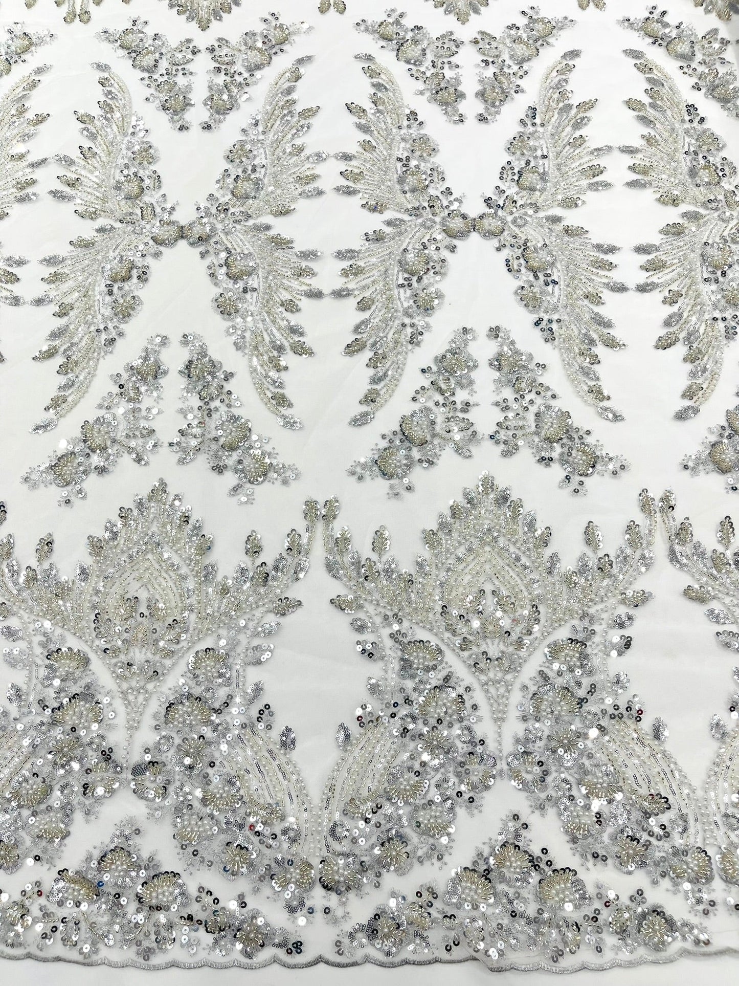Damask Wing Design Embroidered Heavy Beaded Lace on 54" Mesh Fabric.
