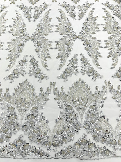 Damask Wing Design Embroidered Heavy Beaded Lace on 54" Mesh Fabric.