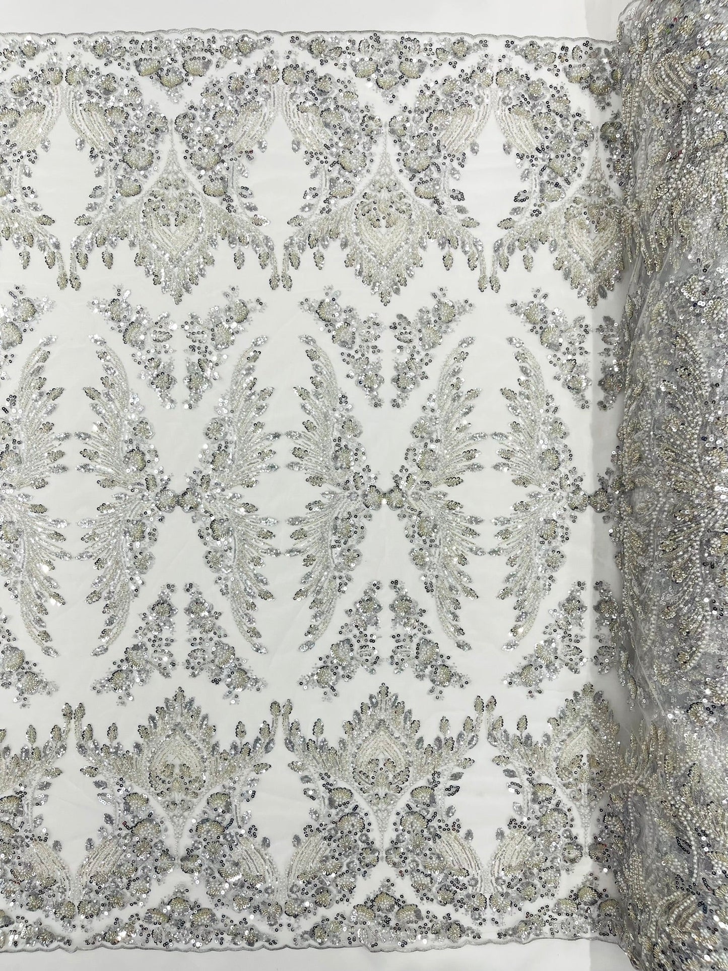 Damask Wing Design Embroidered Heavy Beaded Lace on 54" Mesh Fabric.