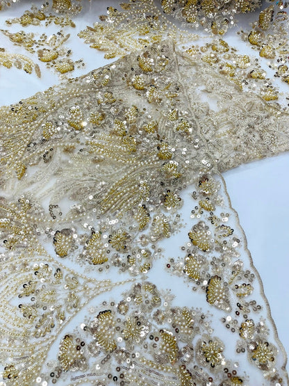 Damask Wing Design Embroidered Heavy Beaded Lace on 54" Mesh Fabric.