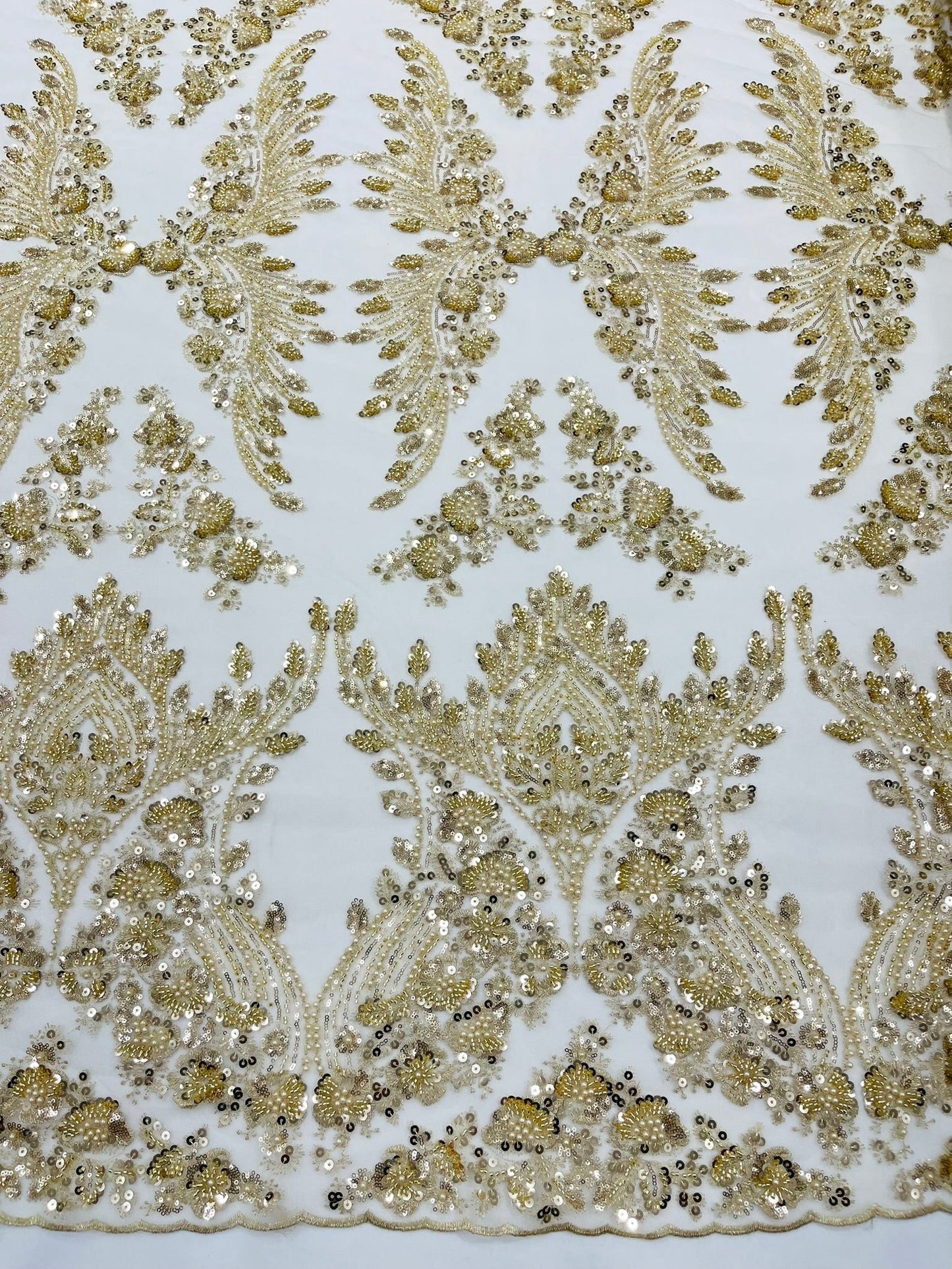 Damask Wing Design Embroidered Heavy Beaded Lace on 54" Mesh Fabric.