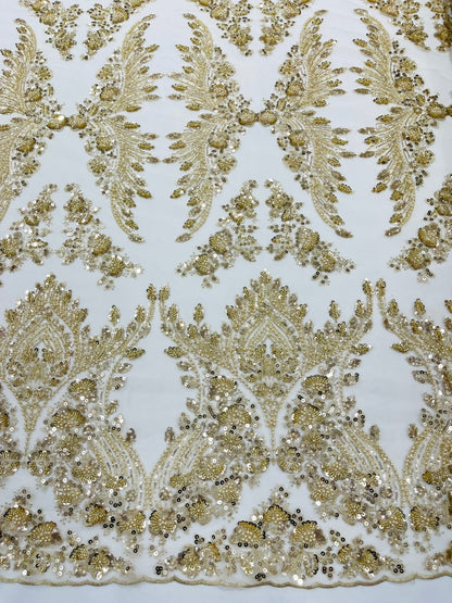 Damask Wing Design Embroidered Heavy Beaded Lace on 54" Mesh Fabric.