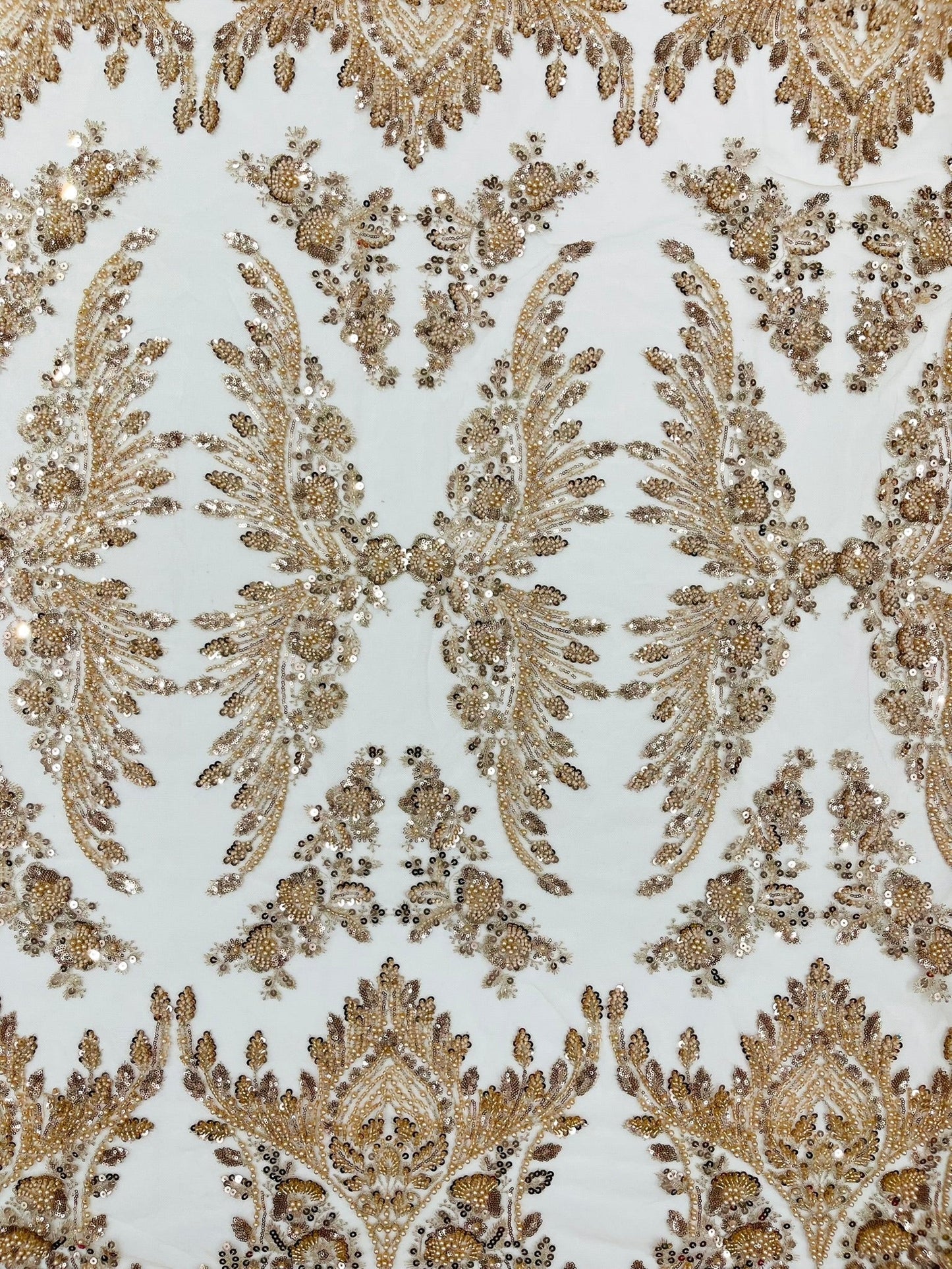 Damask Wing Design Embroidered Heavy Beaded Lace on 54" Mesh Fabric.
