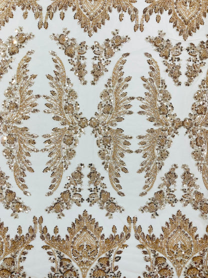 Damask Wing Design Embroidered Heavy Beaded Lace on 54" Mesh Fabric.