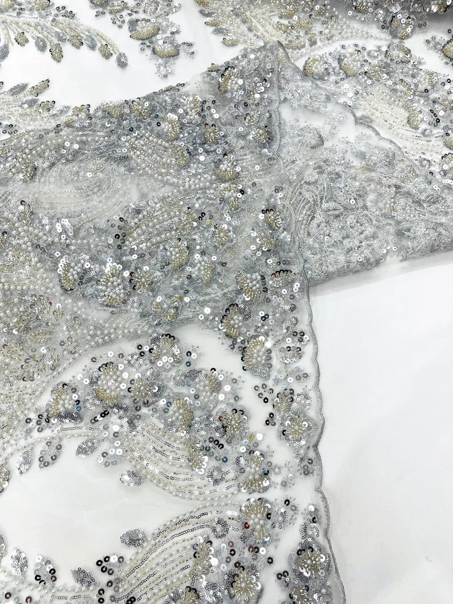 Damask Wing Design Embroidered Heavy Beaded Lace on 54" Mesh Fabric.