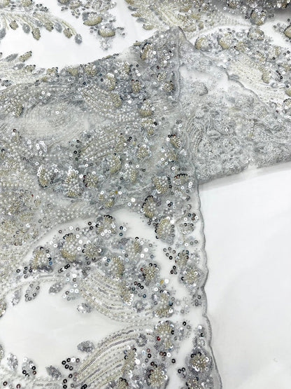 Damask Wing Design Embroidered Heavy Beaded Lace on 54" Mesh Fabric.