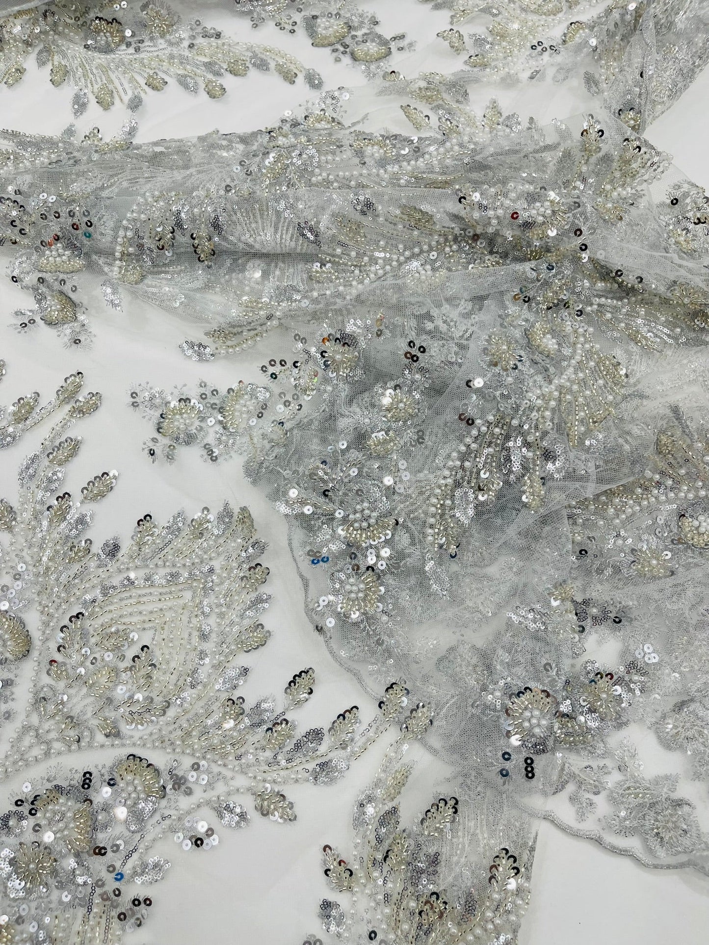 Damask Wing Design Embroidered Heavy Beaded Lace on 54" Mesh Fabric.