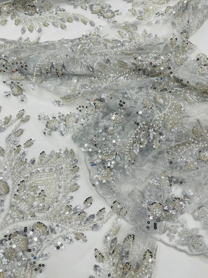 Damask Wing Design Embroidered Heavy Beaded Lace on 54" Mesh Fabric.