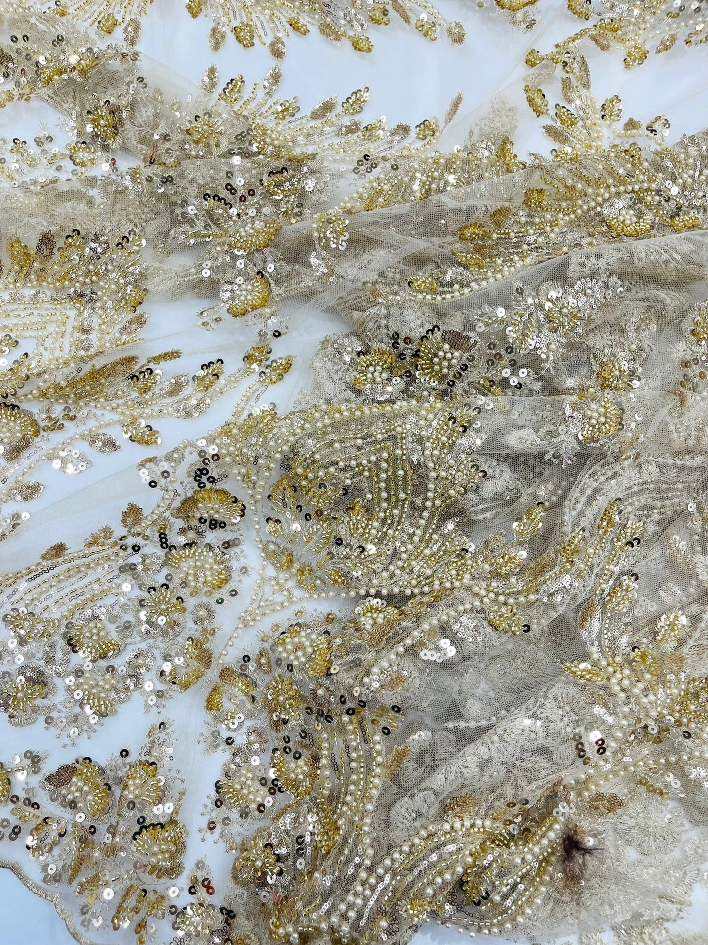 Damask Wing Design Embroidered Heavy Beaded Lace on 54" Mesh Fabric.
