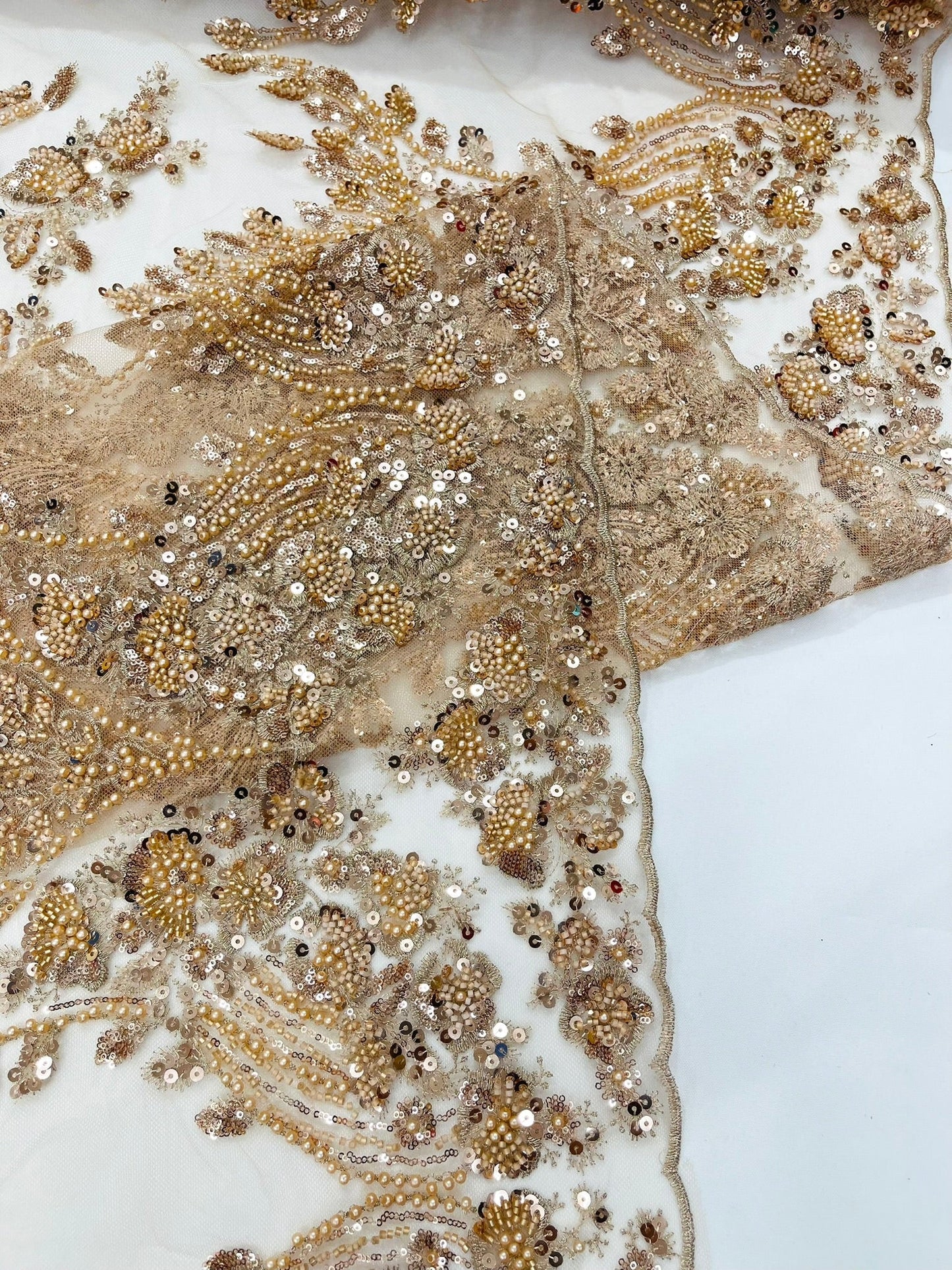 Damask Wing Design Embroidered Heavy Beaded Lace on 54" Mesh Fabric.
