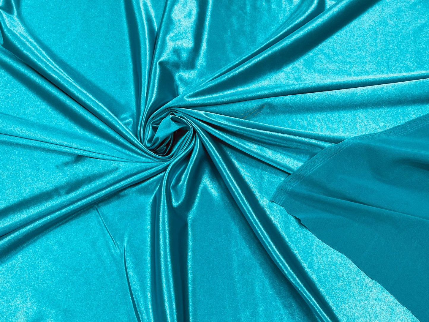 Deluxe heavy shiny polyester spandex 58" Wide| New Creations Fabric & Foam Inc.