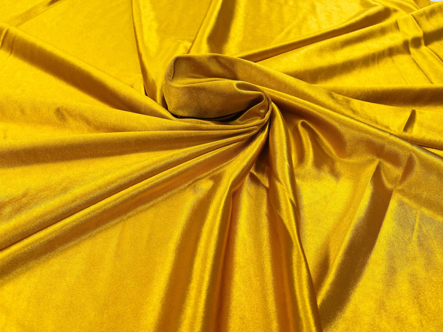 Deluxe heavy shiny polyester spandex 58" Wide| New Creations Fabric & Foam Inc.