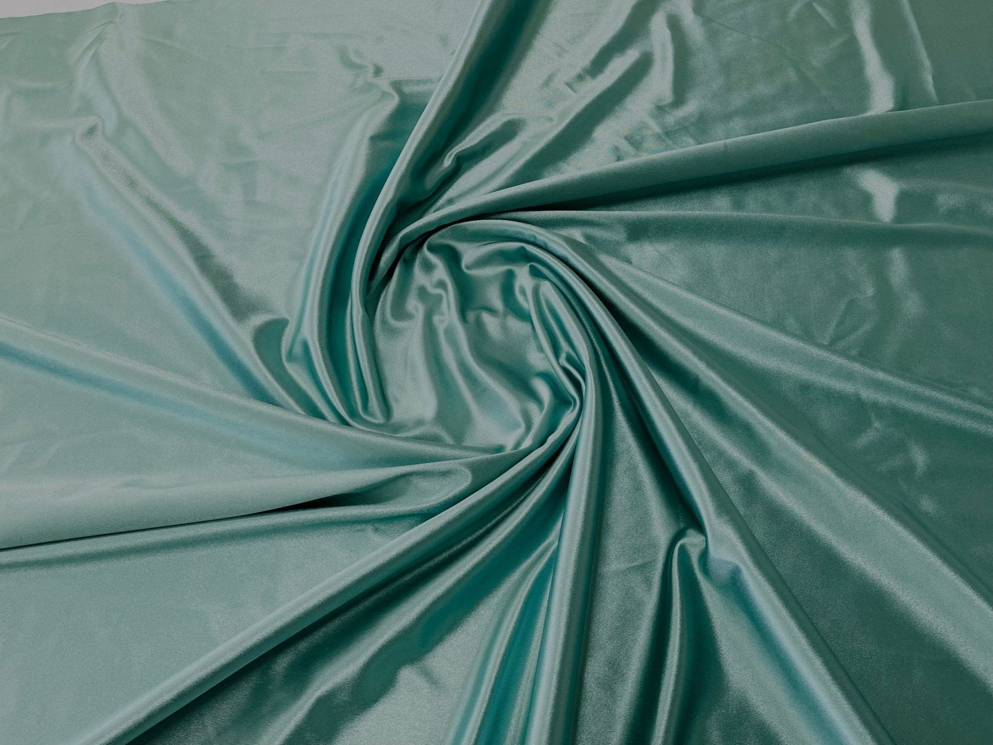Deluxe heavy shiny polyester spandex 58" Wide| New Creations Fabric & Foam Inc.