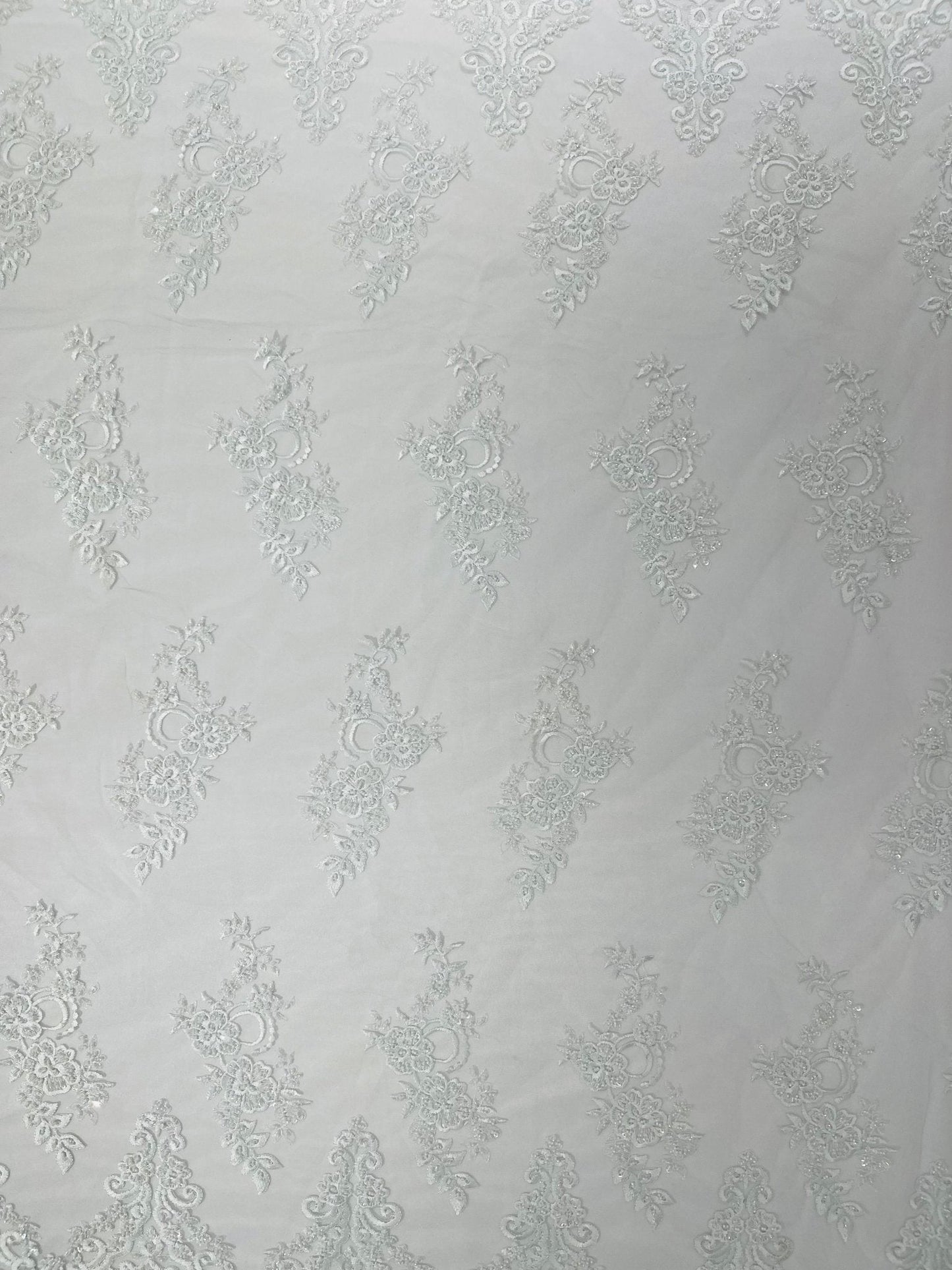 Elegant Beaded Floral Lace on Mesh 54" Wide | New Creation Fabric & Foam Inc.