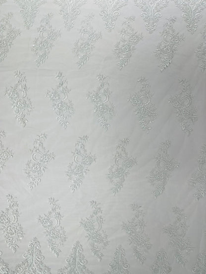 Elegant Beaded Floral Lace on Mesh 54" Wide | New Creation Fabric & Foam Inc.