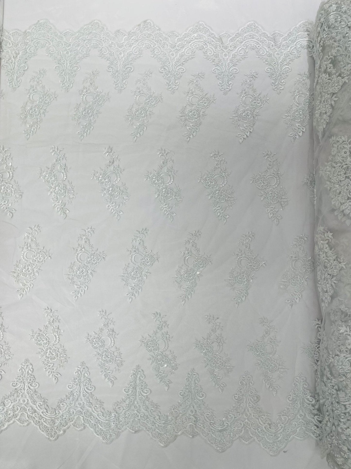Elegant Beaded Floral Lace on Mesh 54" Wide | New Creation Fabric & Foam Inc.
