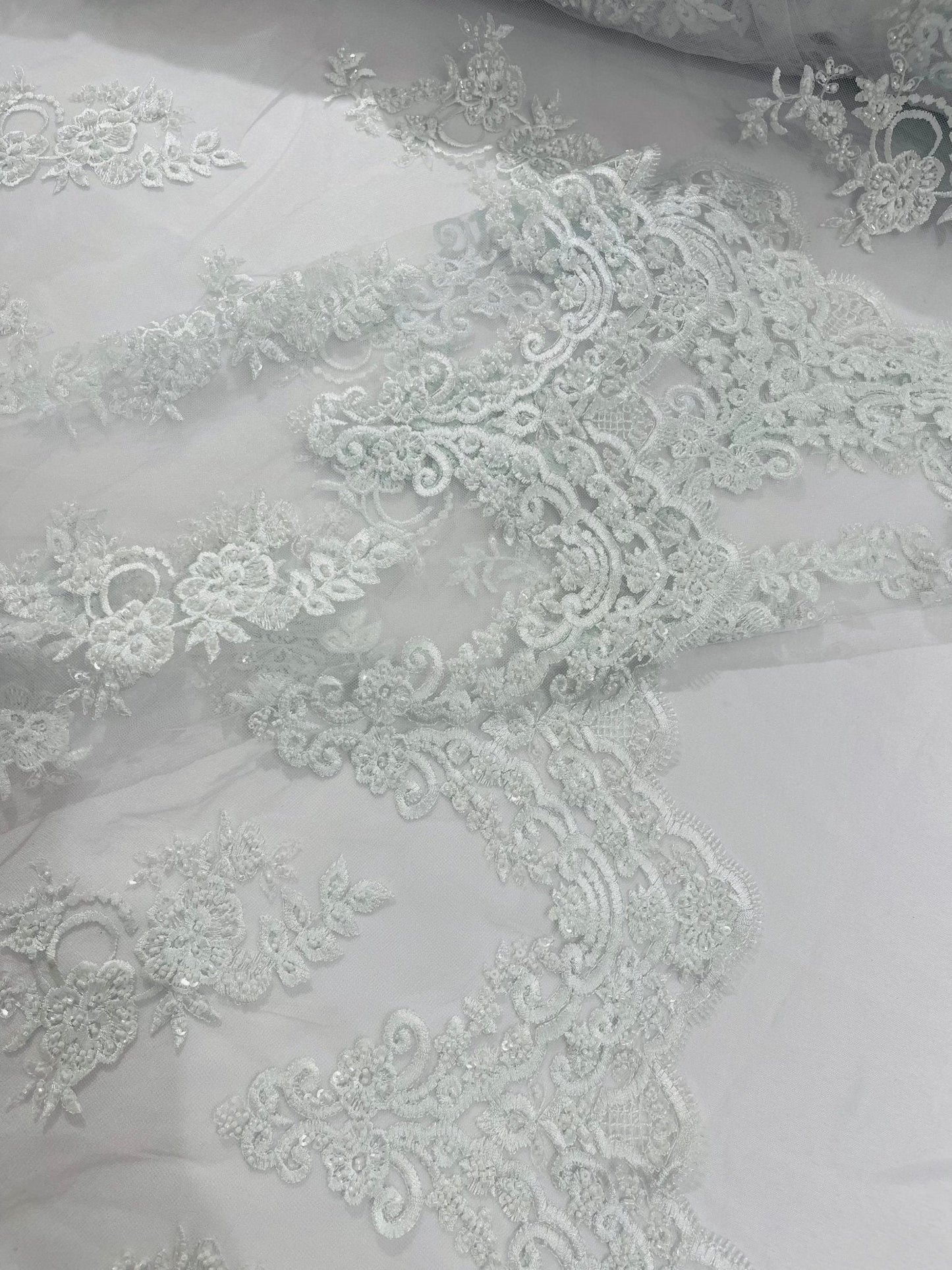 Elegant Beaded Floral Lace on Mesh 54" Wide | New Creation Fabric & Foam Inc.