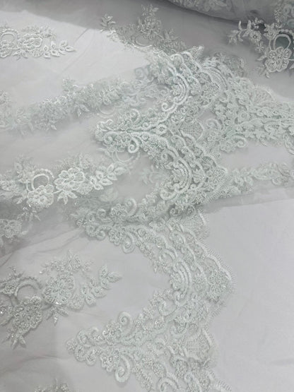 Elegant Beaded Floral Lace on Mesh 54" Wide | New Creation Fabric & Foam Inc.