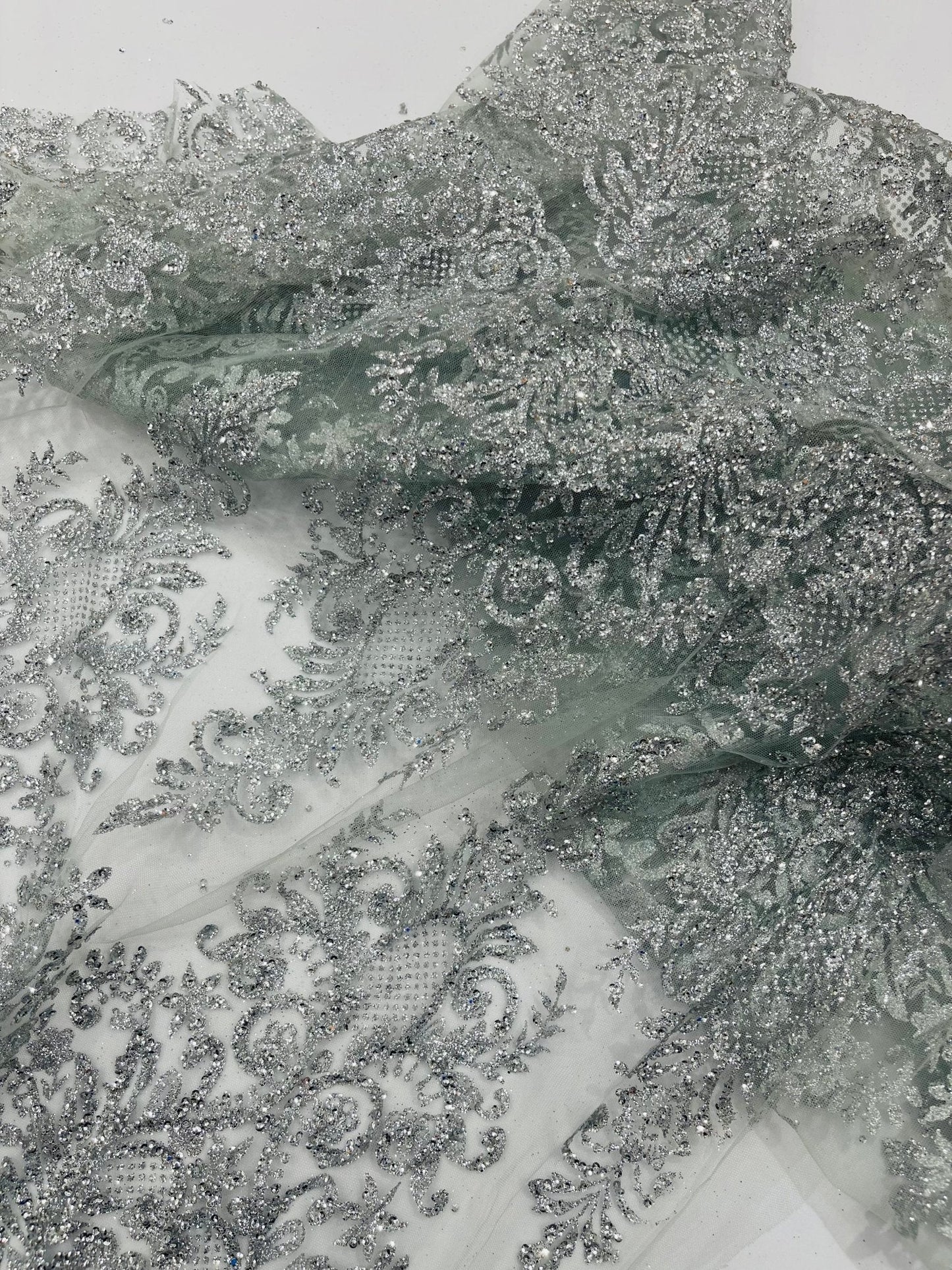 Trim Glitter Damask Design On A Mesh Lace 58" Wide| New Creations Fabric & Foam Inc.